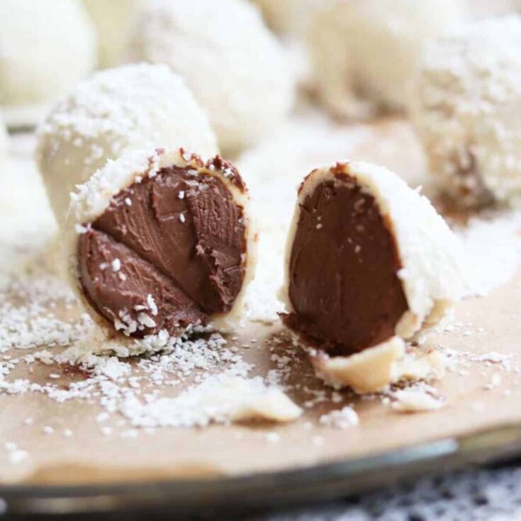 A slice of vegan Christmas chocolate truffles with vanilla, orange or pecan made after reading these Christmas truffle ideas