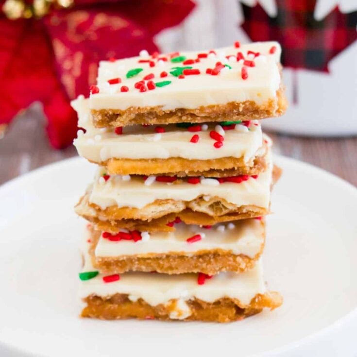 A stack of white chocolate Christmas crack made after reading these Christmas candy recipes