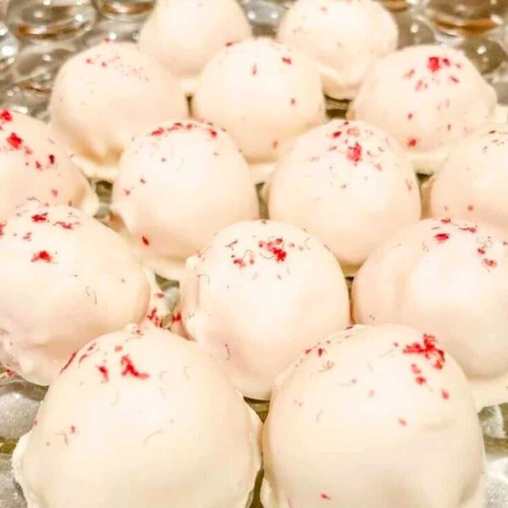 A set of white chocolate raspberry truffles made after reading these Christmas truffle ideas