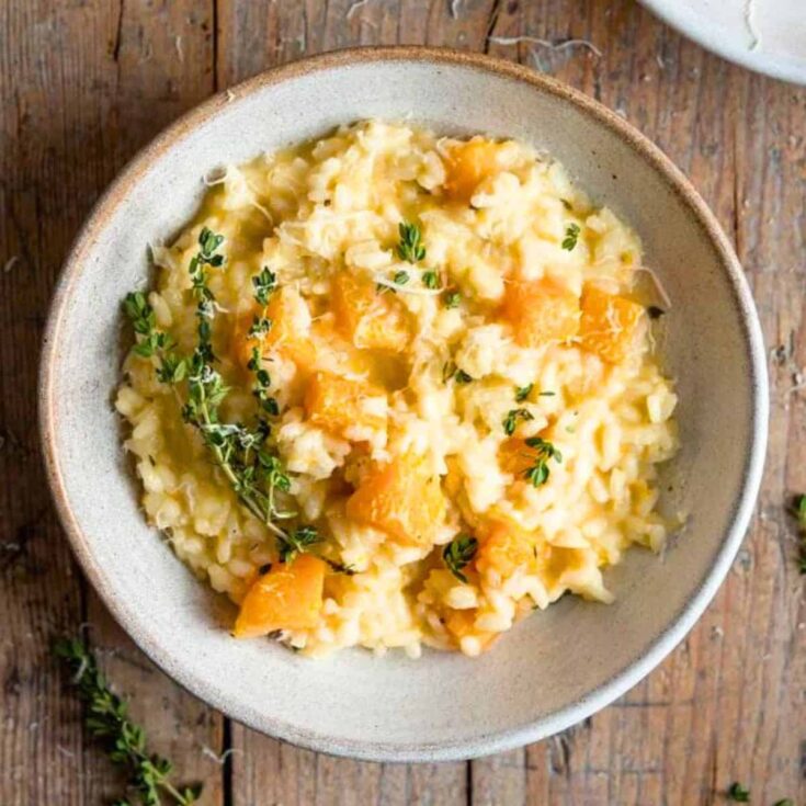 A bowl of butternut squash risotto with thyme made after reading these Fresh pumpkin recipes
