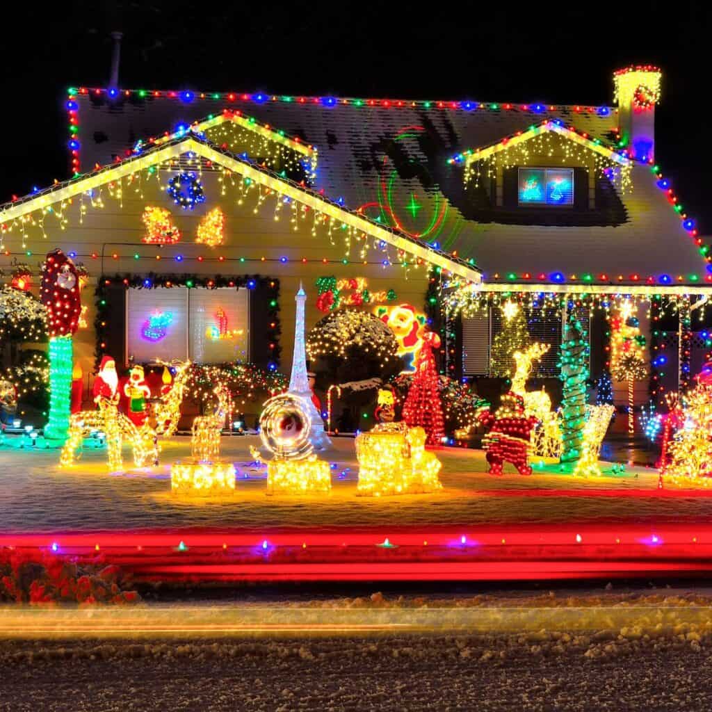 A house filled with Christmas lights, visited after reading these Christmas date ideas