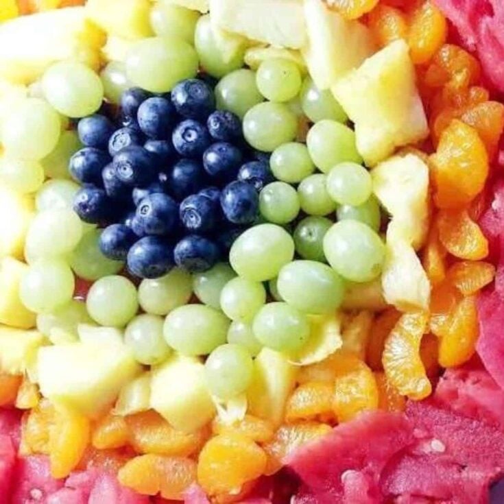 Easy rainbow fruit tray made after reading these St. Patricks Day desserts
