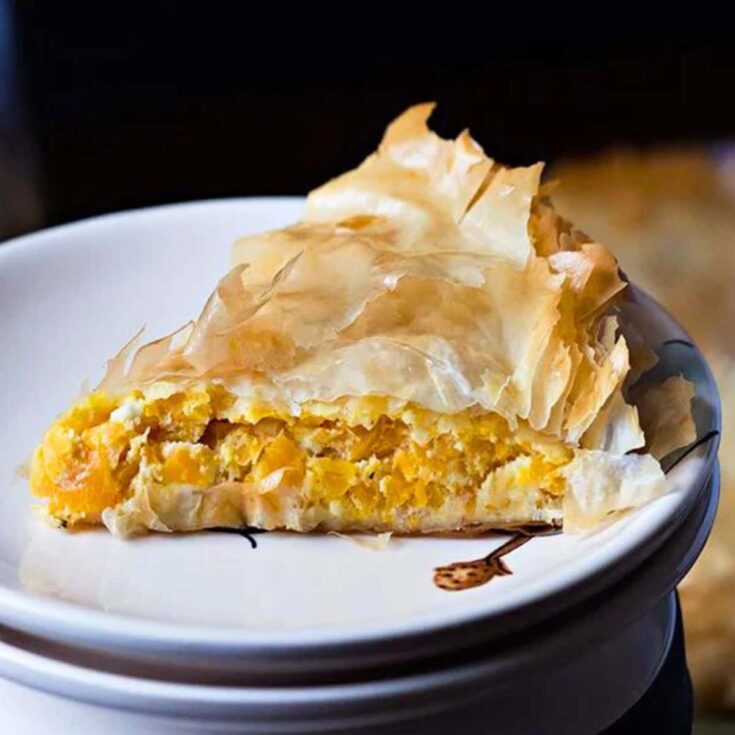 A slice of Greek pumpkin and feta cheese pie made after reading these Fresh pumpkin recipes