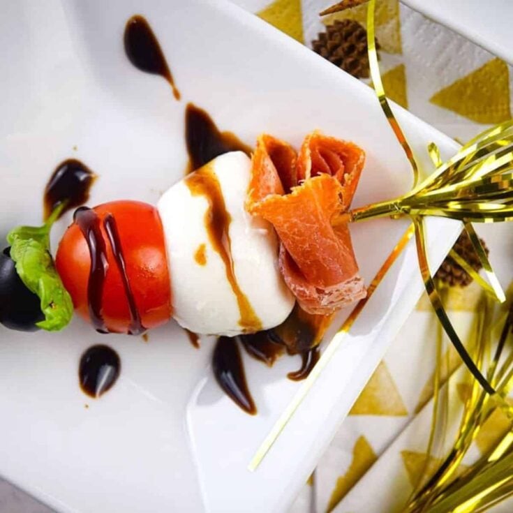 Caprese and prosciutto mini skewers made after reading these New Years Eve appetizers