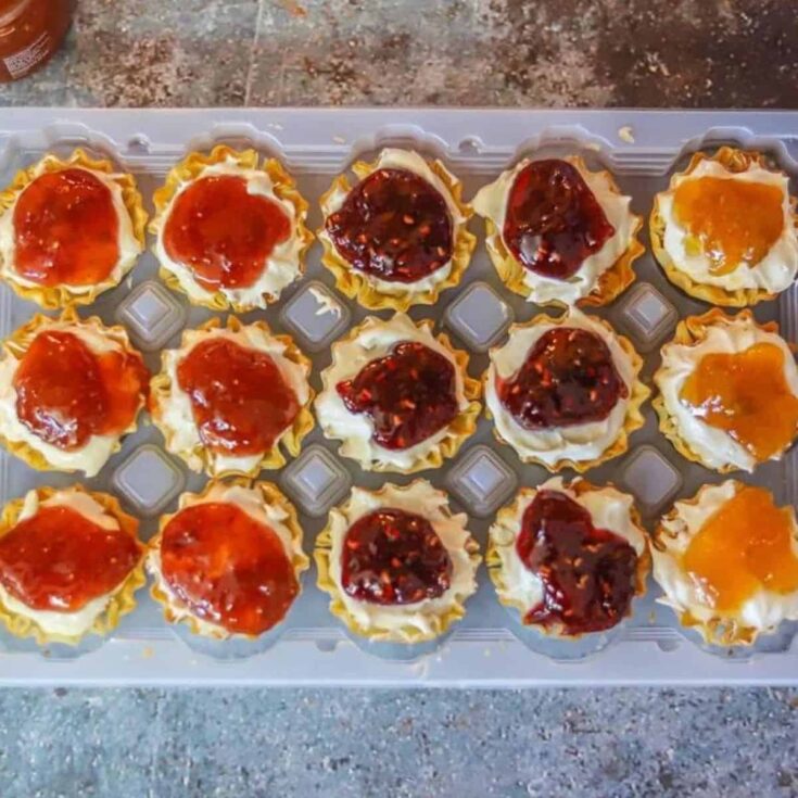 A tray filled with cheesecake phyllo cups made after reading these Mini dessert cups