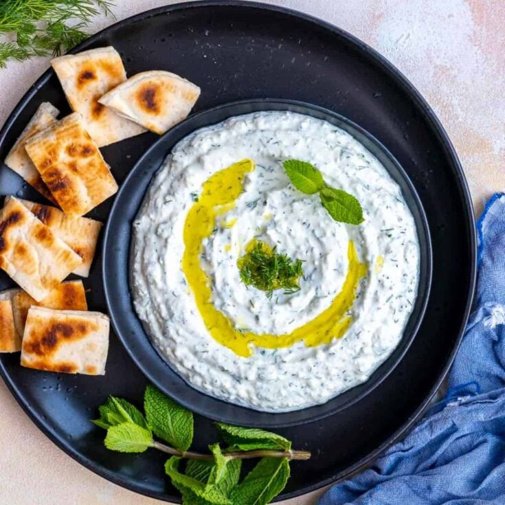 A bowl of Haydari made after reading these New Years Eve appetizers