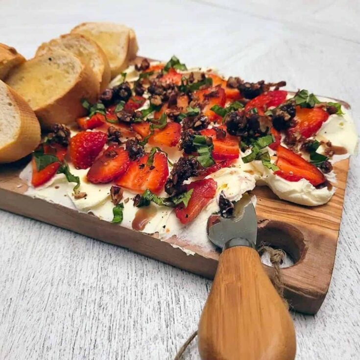 Mascarpone board with balsamic strawberries made after reading these New Years Eve appetizers