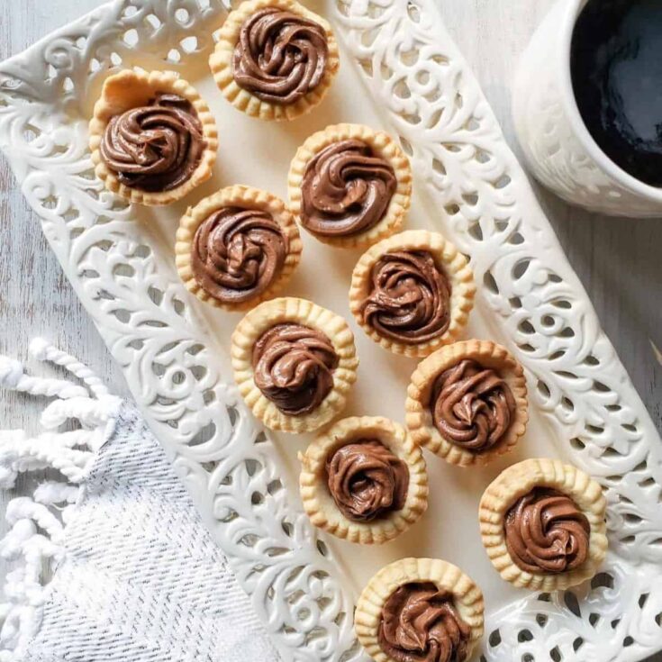 A tray filled with mini chocolate dessert cups made after reading these Mini dessert cups