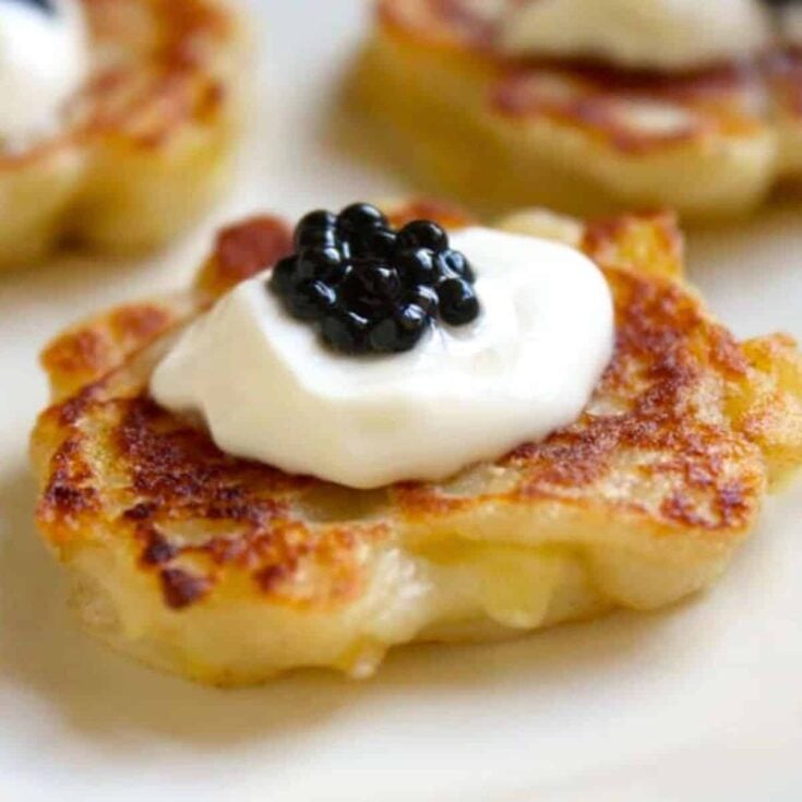 Miniature Irish boxty with truffle caviar made after reading these New Years Eve appetizers