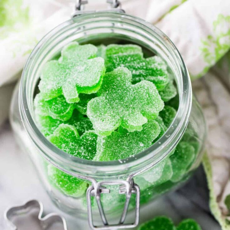 A jar of Shamrock homemade gummies with jello made after reading these St. Patricks Day treats