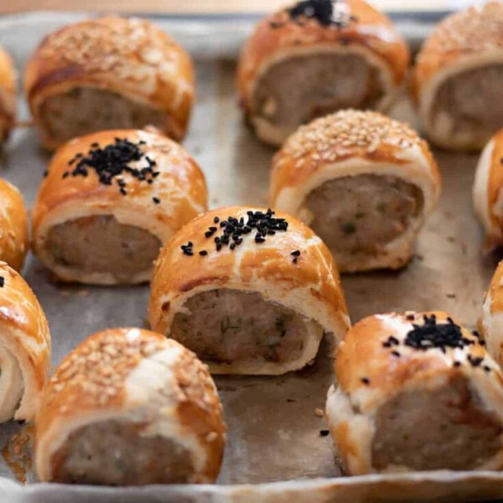A tray of Shortcrust pastry mini sausage rolls made after reading these One bite appetizers