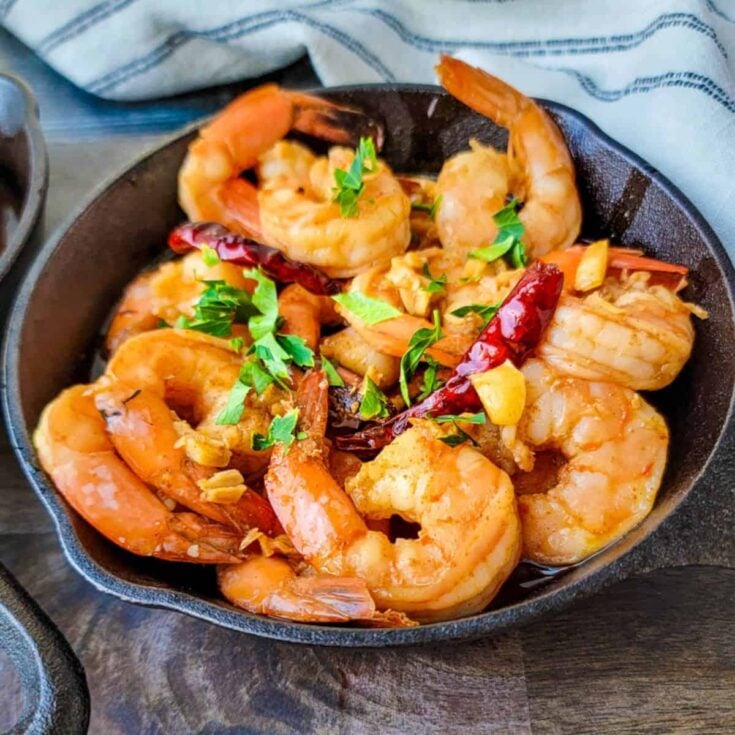 A bowl of Spanish garlic shrimp (Gambas al ajillo) made after reading these New Years Eve appetizers