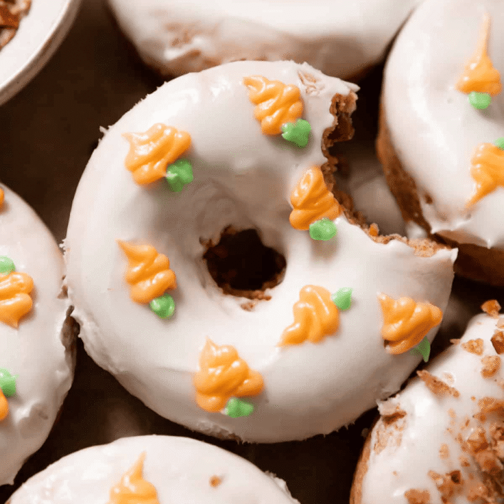 Carrot cake donut with a bite