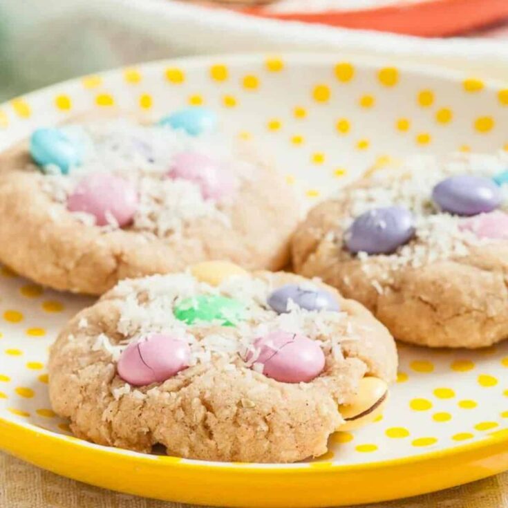 A plate of chewy m&m coconut cookies