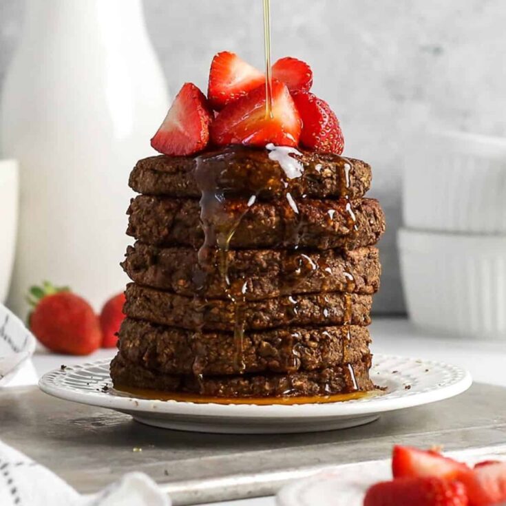 Chocolate protein pancakes topped with strawberries