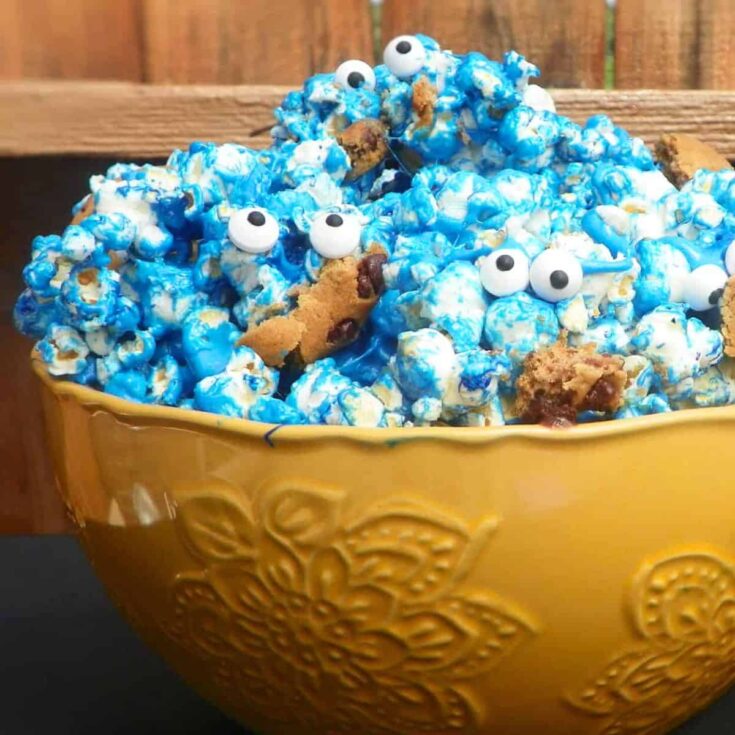 Cookie monster popcorn with eye candies and sticky blue sauce
