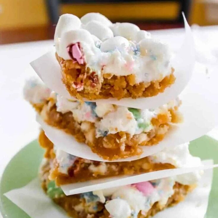 A stack of Easter blondies with m&m's and marshmallows