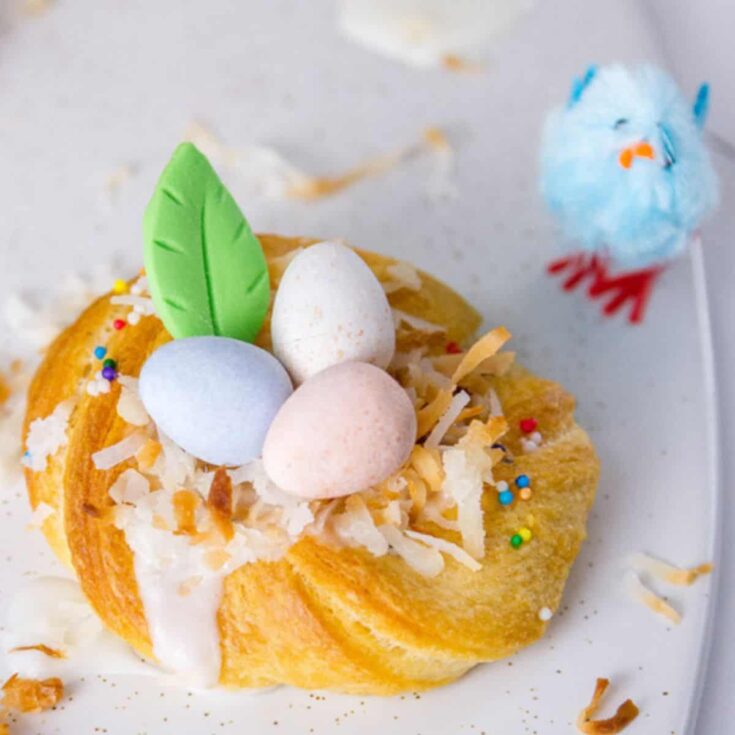 Easter crescent rolls with a blue chick next to it