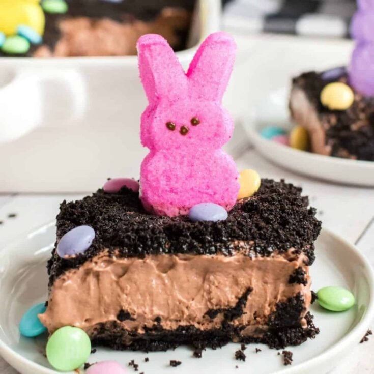 A slice of Easter dirt cake topped with a little bunny