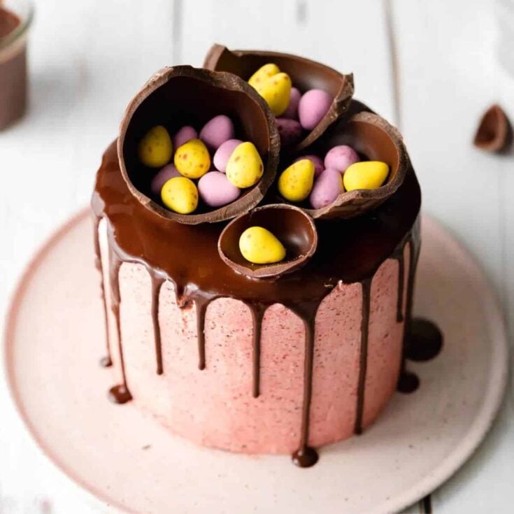 Easter vegan egg cake topped with small eggs