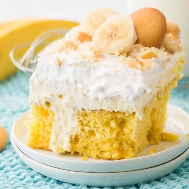 A slice of banana pudding poke cake