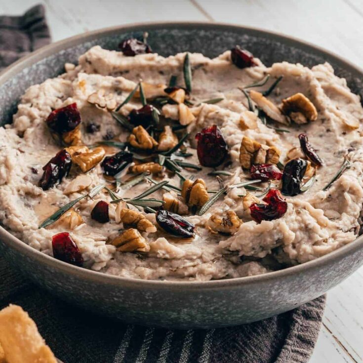 A bowl of festive white bean hummus