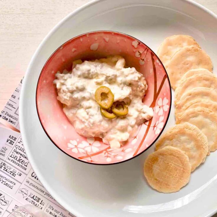 A bowl of five minute cream cheese olive dip