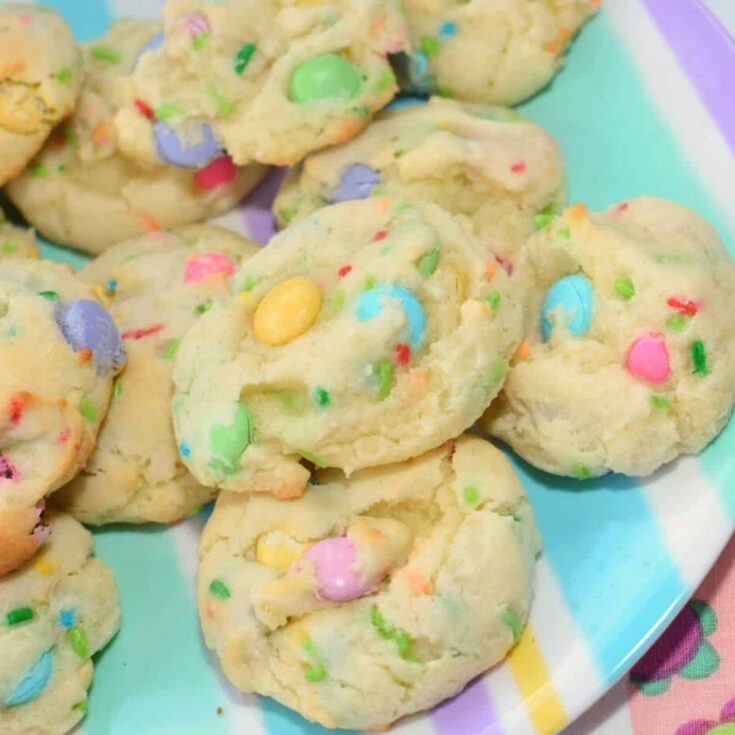 A plate filled with Funfetti Easter m&m cookies