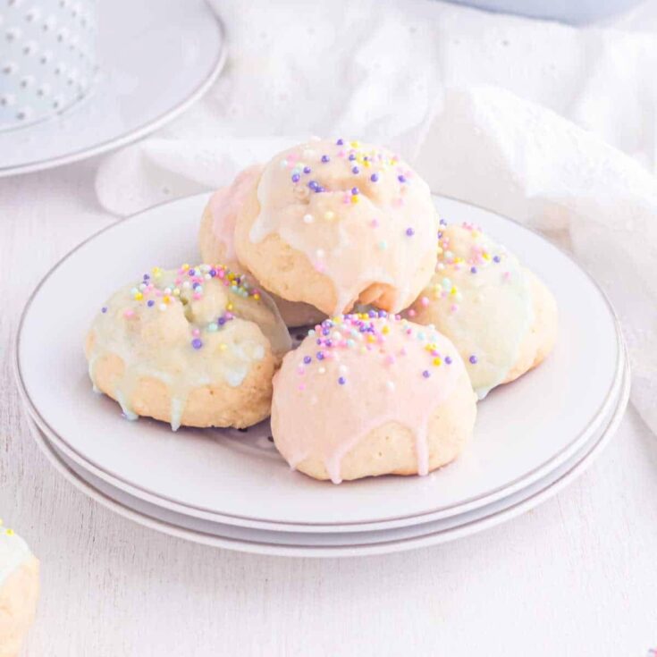 A plate of Italian Easter cookies topped with colorful sprinkles