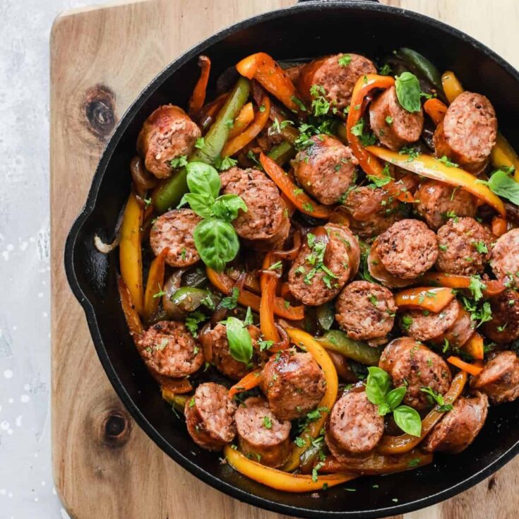Italian sausage onions and peppers skillet on a pan