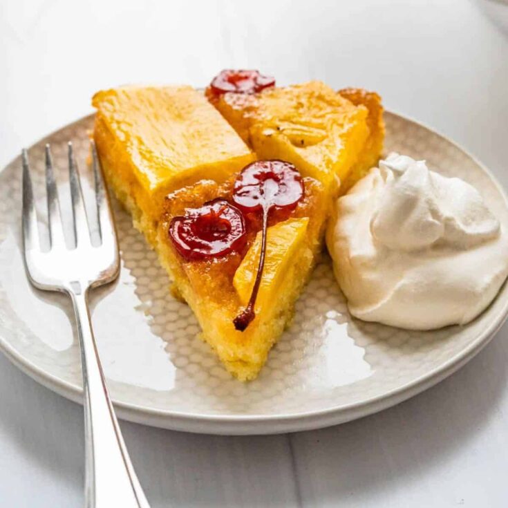 A slice of upside-down pineapple rum cake