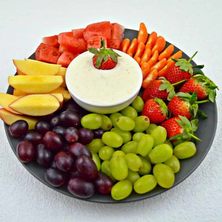 Yogurt fruit dip with fresh fruits on the side