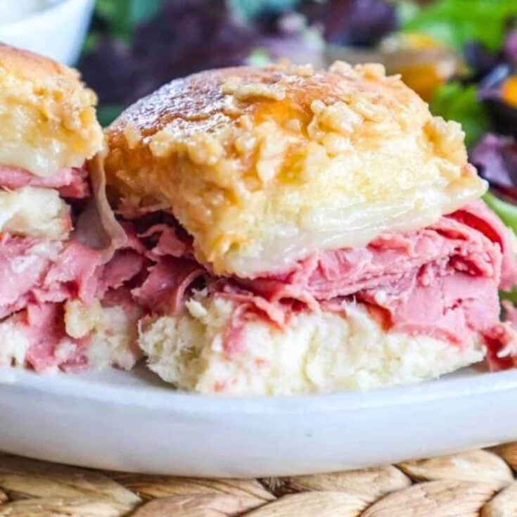 Baked roast beef sliders on a plate