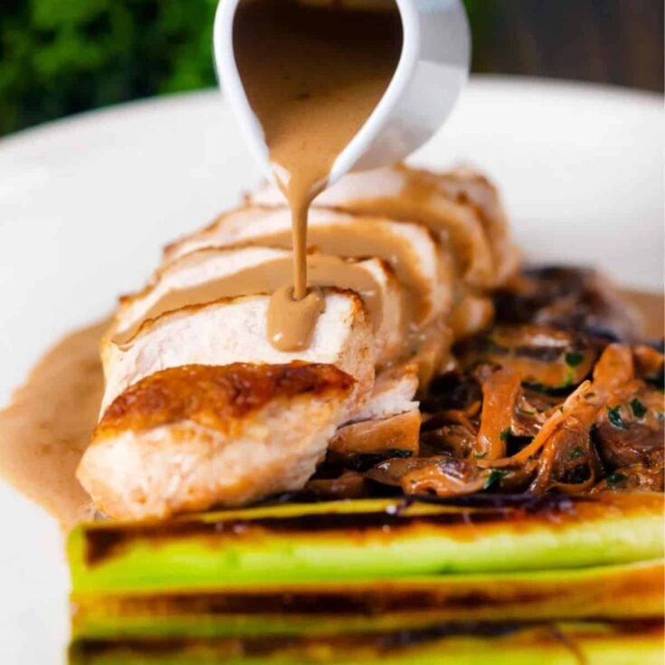Chicken forestiere with tarragon poured with cream