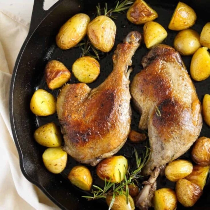 Confit de canard with potatoes on the side