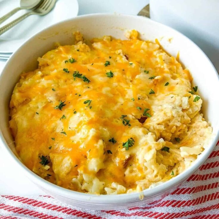 Crockpot funeral potatoes in a bowl