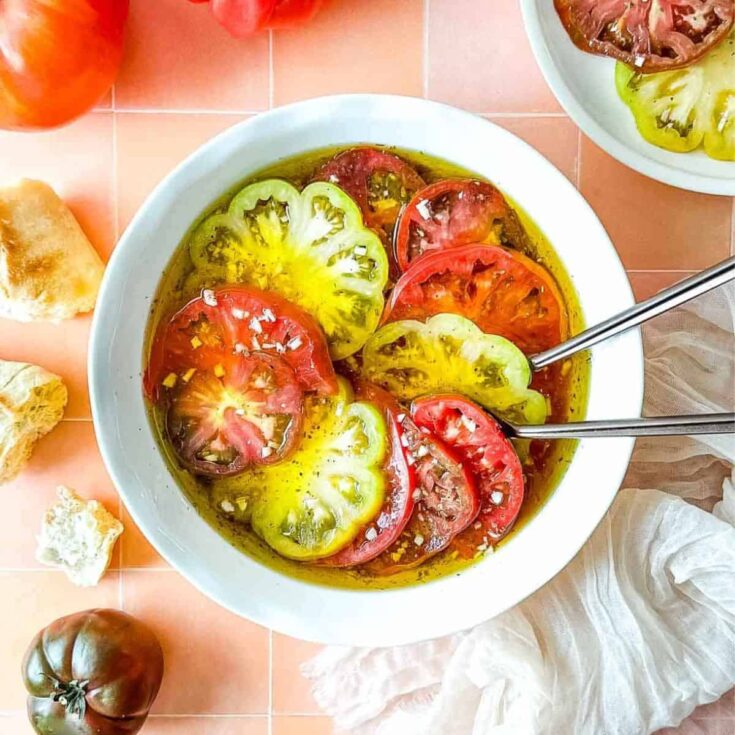 Marinated heirloom tomatoes in a bowl