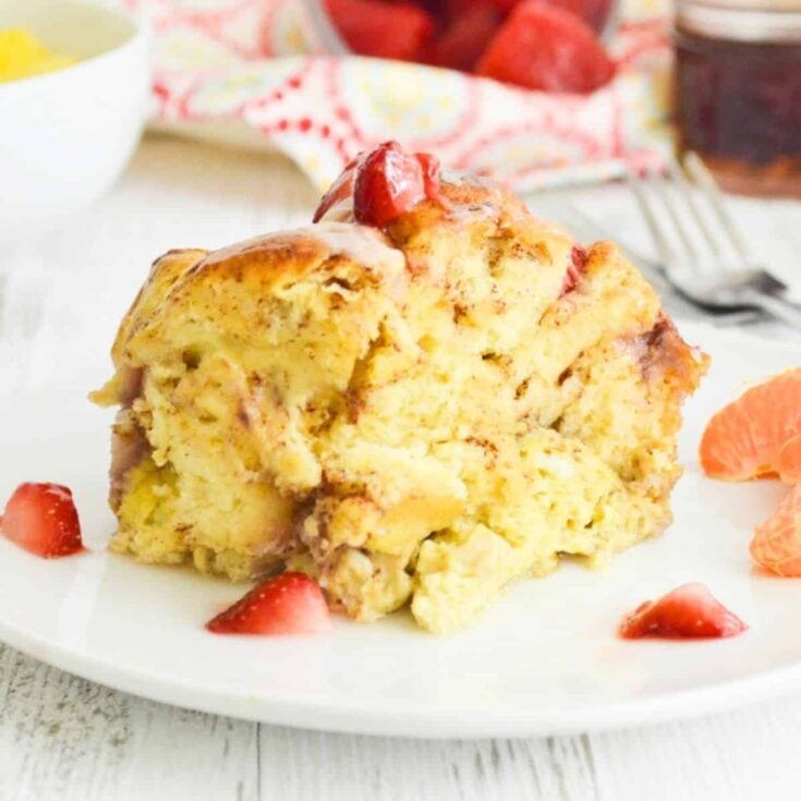 Strawberry cinnamon roll French toast on a plate