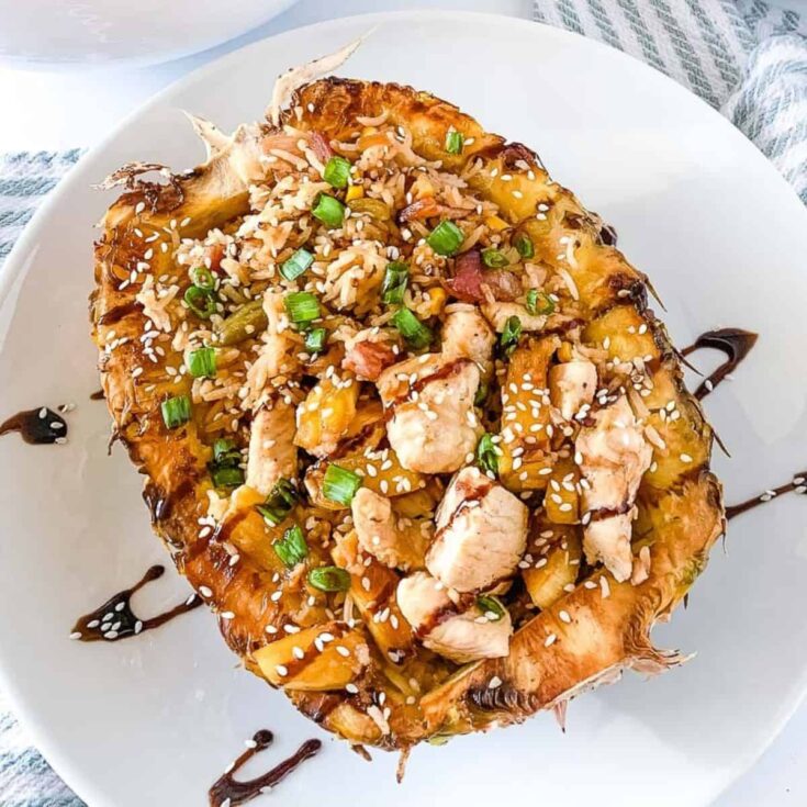 Teriyaki chicken on a pineapple bowl