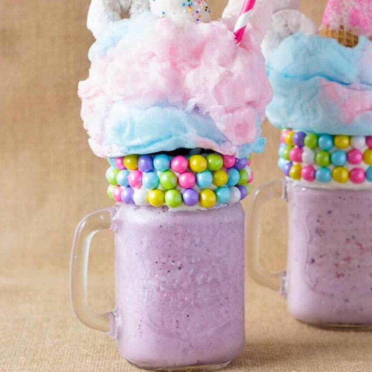 Unicorn freakshakes topped with cotton candy