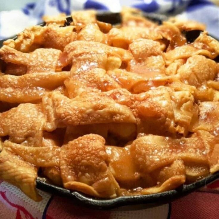 Blue ribbon caramel apple pie in a pan
