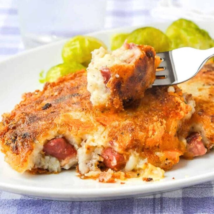 Cheddar ham potato cake on a plate