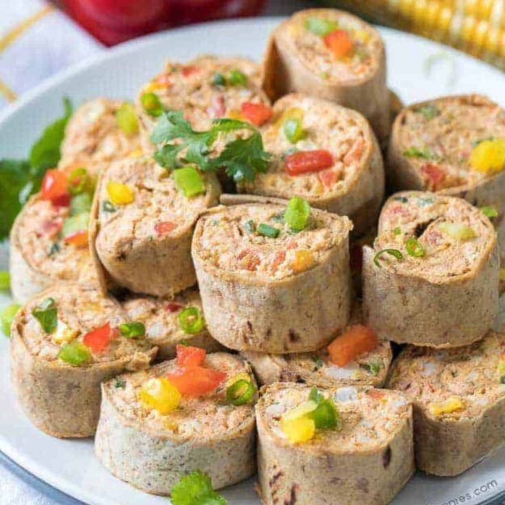 A plate of chicken taco pinwheel appetizers