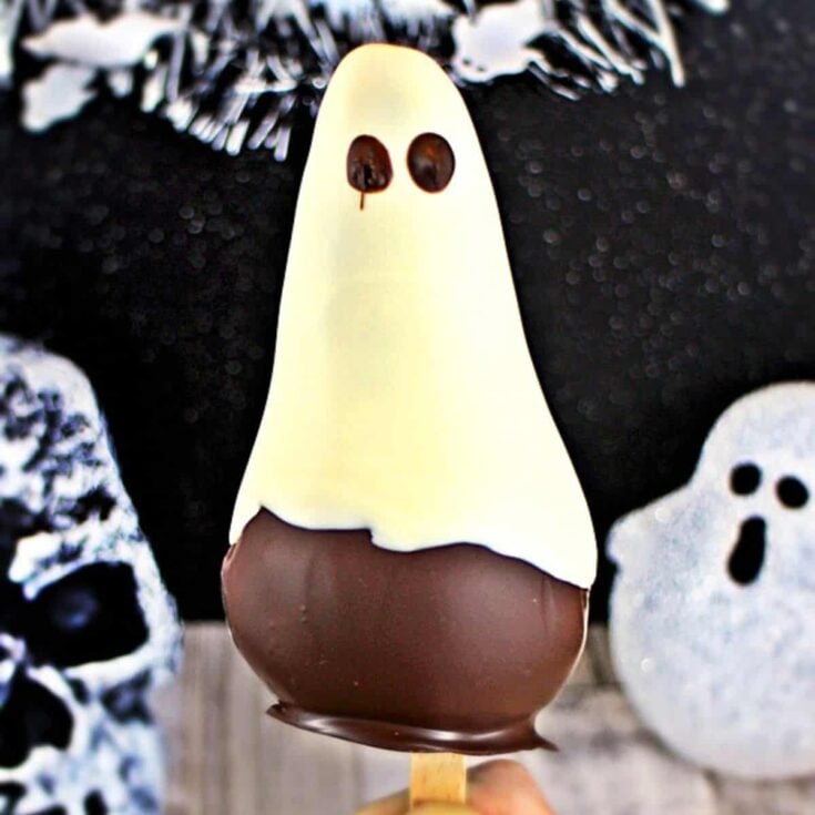 Chocolate covered pear ghost made after reading these Halloween lunch ideas
