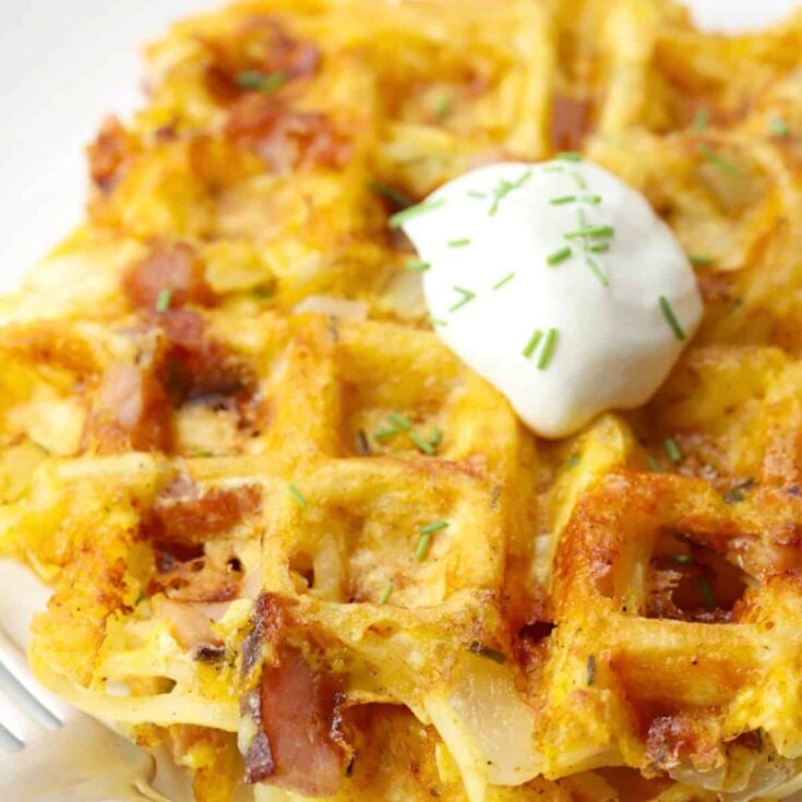 Ham and cheese hash brown waffles on a plate