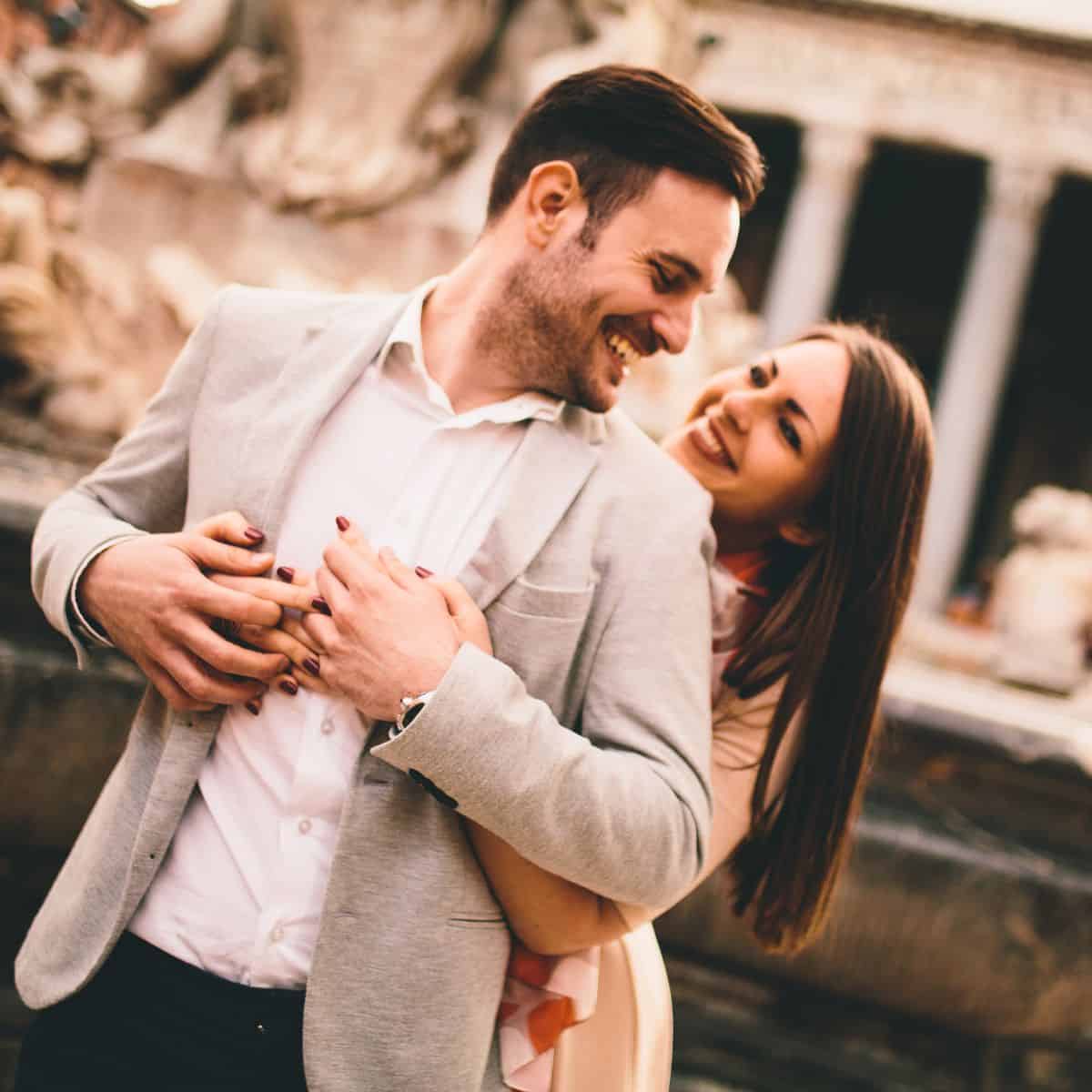 A happy couple in a backhug