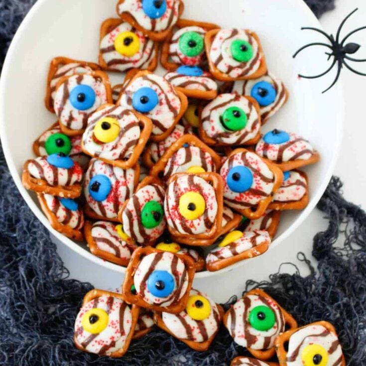 A bowl of monster eyeball pretzels made after reading these Halloween treats