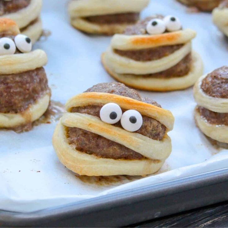 Mummy meatballs on a tray
