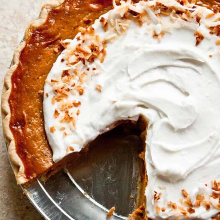 Sliced orange spice coconut pumpkin pie