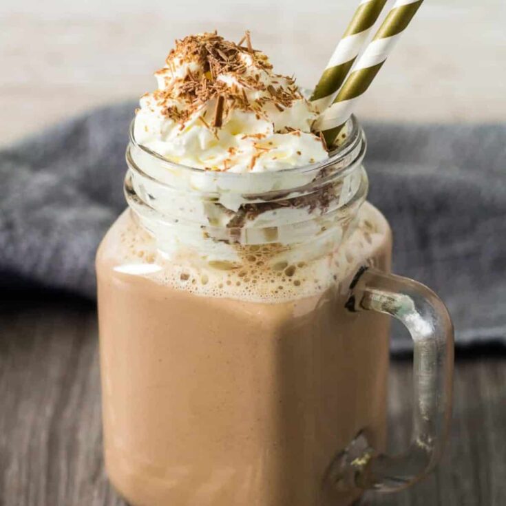 Pumpkin spice hot chocolate in a mason jar
